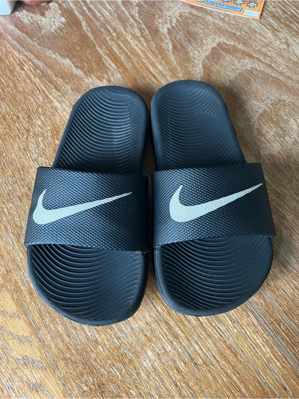 Nike kids Black Slide Sandals with White Swoosh